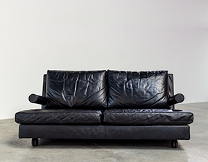 Black leather two seater Baisity design by Antonio Citterio