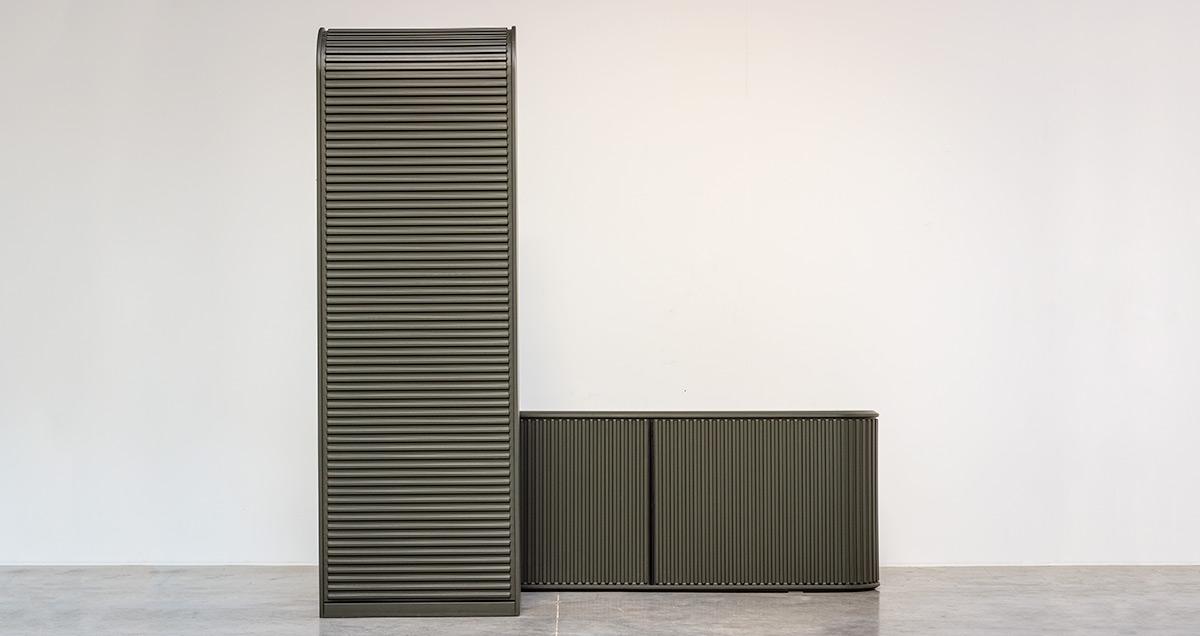 Roller shutter designed by Aldo van den Nieuwelaar for Pastoe, 1978. The A'dammer storage cabinet is a typical example of minimalist geometrical design. Dutch design classic. Olive green lacquered wood with a functional ribbed roller door that slides up the unit. Five modular shelves inside.