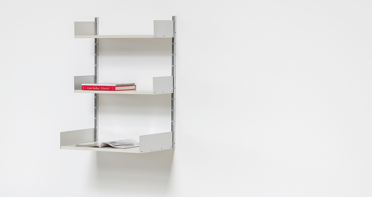 This shelving system, designed by Dieter Rams for Vitsoe, is an early production model dating from circa the 1960s to early 1970s. This is a prime example of minimalist functionality, it embodies Rams iconic design philosophy: Less, but better.