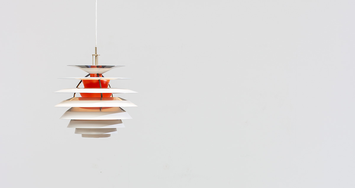 PH Contrast designed by Poul Henningsen for Louis Poulsen. Circa 1960. The pendant consists of 10 aluminum discs. Each shade consists of four different surfaces in orange, blue, white and chrome for perfect reproduction of the light.